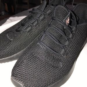 Black Adidas Tubular Sneakers with pink logo